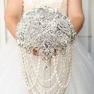 Elegant silver brooch bouquet. Pearl cascading bridal bouquet