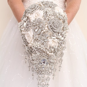 Elegant glamour: silver jeweled super  bling brooch bouquet with ivory/ white flowers