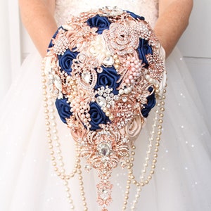 Brooch bouquet navy blue champagne rose gold. Cacsading wedding bouquet.