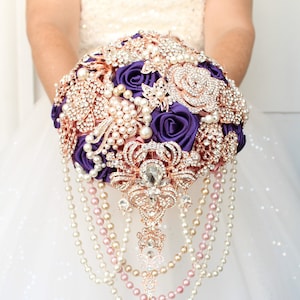 Royal purple brooch bouquet. Rose gold cascading glamour plum wedding bouquet