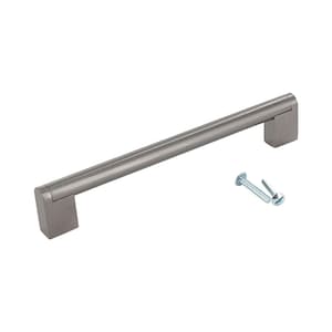May include: A brushed nickel cabinet pull with square ends and a cylindrical center. The pull comes with two screws.