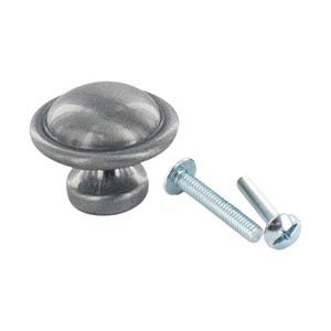May include: A pewter cabinet knob with a round, domed top and a small, round base. The knob comes with two screws.