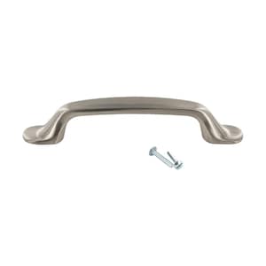 May include: A brushed nickel cabinet pull with rounded edges and a slight curve. The pull comes with two screws.