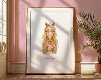 May include: A framed art print featuring a horse with a pink face mask, holding makeup brushes and a jar of cream. The artwork has a gold frame and the text "HOT HORSE GIRL ERA" at the bottom. The horse has long blonde hair.