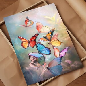 May include: A colorful painting of butterflies with a soft, dreamy background. The butterflies are in various shades of blue, purple, orange, yellow, and red. The butterflies are arranged in a cluster, with their wings spread out.