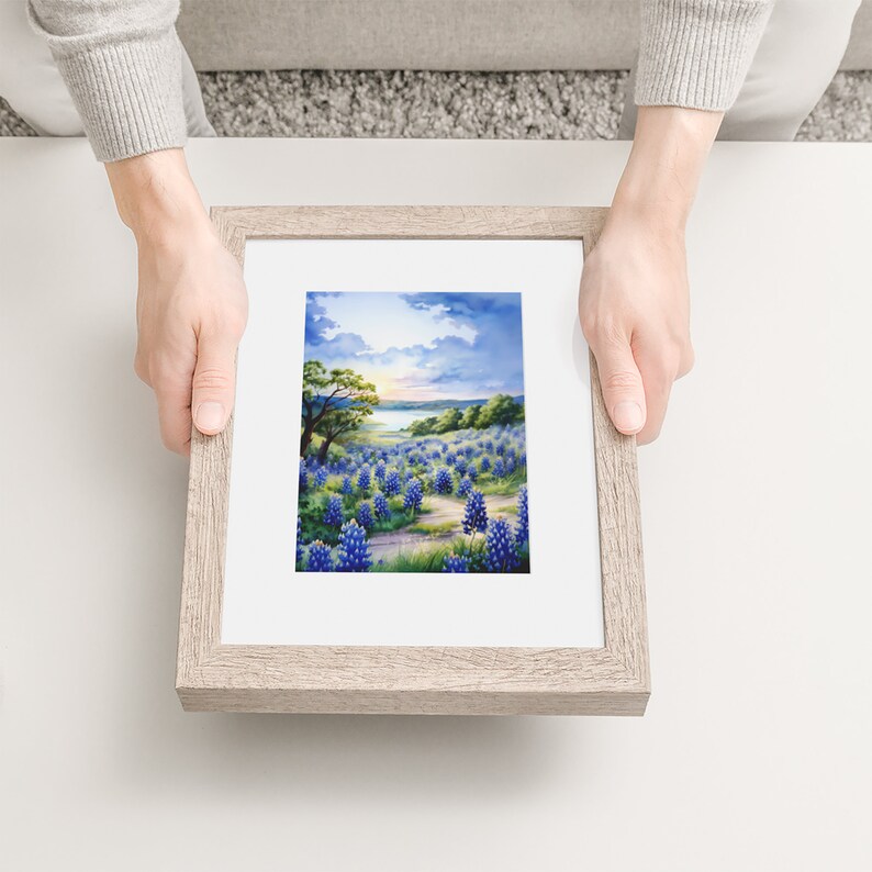 Celebrate Texas wild beauty with this watercolor print of Muleshoe Bend bluebonnet fields. Perfect for nature lovers and Lone Star enthusiasts. Tranquility of a Texas ranch sunset with this rural landscape art. Heart of the Hill Country Texas.