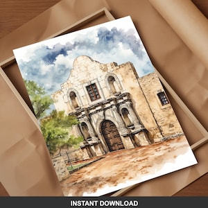 May include: Watercolor print of The Alamo, a historic mission in San Antonio, Texas. The artwork depicts the building's facade with a detailed rendering of the architecture, set against a cloudy sky. The print is displayed in a wooden frame. Text: INSTANT DOWNLOAD.