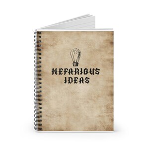 May include: A spiral bound notebook with a vintage-style brown paper cover. The cover features a black and white illustration of a light bulb and the text "NEFARIOUS IDEAS" in a gothic font.