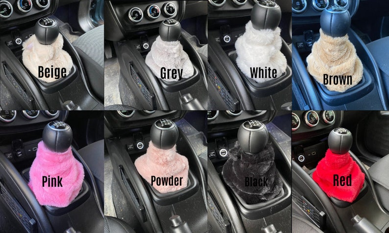 May include: Eight different coloured faux fur gear shift covers for a car. The colours are beige, grey, white, brown, pink, powder, black, and red.
