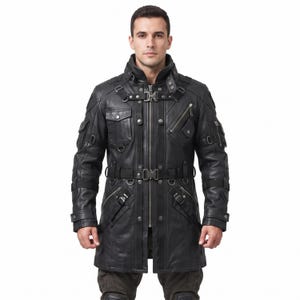 May include: A black leather jacket featuring a high collar, a central zipper, and a waist belt with a metal buckle. The jacket includes multiple utility pockets with snap buttons, diagonal zippered compartments, and decorative straps with metal hardware.