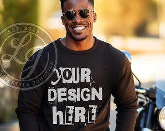May include: A black long-sleeved sweatshirt with the text "YOUR DESIGN HERE" in white. The image also features a circular logo with the text "LIFESTYLE JUNCTION EST. 2023". The sweatshirt is being worn by a person wearing sunglasses.