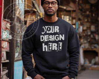May include: A black sweatshirt with a white graphic that says "YOUR DESIGN HERE" in a distressed font.