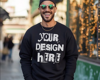 May include: A black sweatshirt with the text "YOUR DESIGN HERE" printed in white on the front. The sweatshirt is being worn by a person with a black cap and sunglasses.