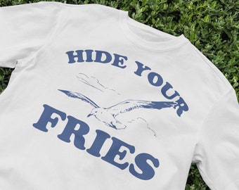 Hide Your Fries Tシャツ、面白いカモメのグラフィックTシャツ、レトロな動物のシャツ、90年代のヴィンテージスタイル、風変わりなカモメのデザイン、遊び心のあるカモメのユーモアシャツ