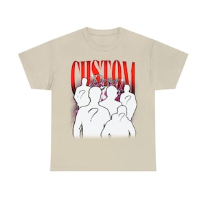 May include: A beige t-shirt with a red graphic print of the word "CUSTOM" and a group of white silhouettes of people with question marks on their heads. The graphic is surrounded by a pink and purple haze.