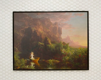 May include: A framed painting depicting a landscape with a river, mountains, and a figure in a boat. The sky is a soft pink and orange, and the mountains are a deep brown. The figure in the boat is wearing a white robe and has a halo.