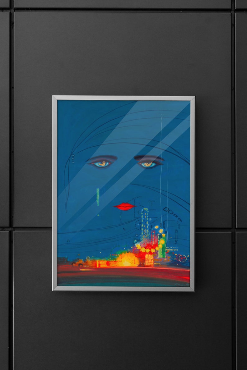 May include: A framed painting of a woman's face with blue eyes and red lips. The background is a dark blue with a cityscape in the bottom half of the painting.