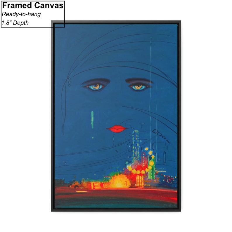May include: Framed canvas print of a stylised woman's face with blue eyes and red lips. The background is a dark blue with a cityscape in the bottom half of the image.