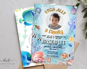 May include: A blue and white invitation card with an underwater theme. The card features a photo of a baby boy, a yellow fish, a blue octopus, and the text "O'Fish-ally a family". The card also includes the text "Please join us in celebrating the adoption of our son Jaxson Lee" and the date and time of the event.