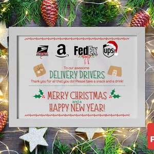 May include: A printable sign with a white frame and a gray background. The sign says "To our awesome DELIVERY DRIVERS Thank you for all that you do! Please take a snack and a drink! MERRY CHRISTMAS and a HAPPY NEW YEAR!" The sign also features logos for the United States Postal Service, Amazon, FedEx, and UPS.