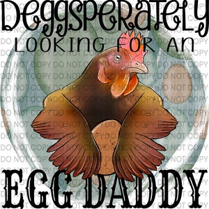 May include: A digital illustration features a brown hen with a red comb and wattle, holding an egg. The text reads "DEggsperately Looking For An Egg Daddy" in a whimsical font, set against a background of light blue and green circles.