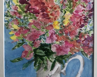 May include: Watercolor painting of a bouquet of pink, red, and purple flowers in a white pitcher with a floral pattern. The flowers are arranged in a vase with a blue background.