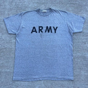 May include: A gray t-shirt with the word "ARMY" printed in black on the front.