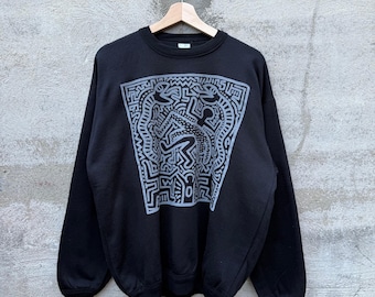 Sudadera negra con cuello redondo y obra de arte de Keith Haring de los años 90