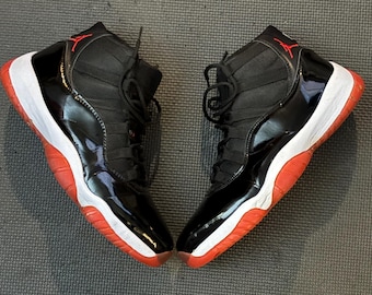 Jordan 11 retro bred (2019) used sneakers size 11 us  , ship extremely fast for Xmas