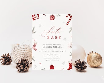 May include: A white baby shower invitation with red and white illustrations of Christmas ornaments, candy canes, stockings, and a Santa hat. The text reads "Santa Baby" and "Join us for a baby shower honoring Lauren Miller, Saturday, December 1st, 1-4 PM, the clause home, 123 snowflake lane, city, state. RSVP to jennifer at 123-456-7890, registered at babylist.com."