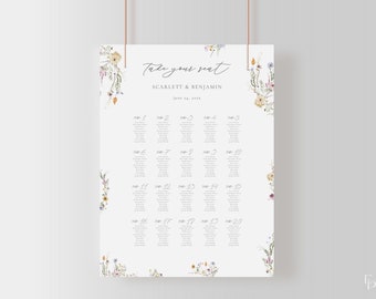 May include: A white wedding seating chart with a floral border. The chart is titled "Take your seat" with the names "Scarlett & Benjamin" and the date "June 24, 2023". The chart lists table numbers 1 through 20 with guest names.