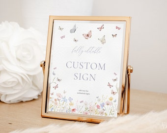 Op de afbeelding: Een gouden lijst met een witte achtergrond en een aquarelontwerp van vlinders en bloemen. De tekst op het bord luidt "volledig bewerkbaar AANPASSINGSBORD tekst bewerken voor onbeperkt aantal borden".