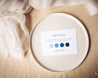 Puede incluir: Una tarjeta blanca con la palabra "ATTIRE" en texto negro. La tarjeta también incluye el texto "WE KINDLY REQUEST OUT GUESTS TO WEAR A SHADE OF BLUE TO OUR SPECIAL DAY" y una paleta de colores de cinco tonos de azul. La tarjeta también incluye el texto "cocktail attire" en cursiva.