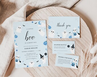 May include: A blue and white baby shower invitation with a ghost and pumpkin theme. The invitation says "A little boo is almost due" and includes the name Sarah Miller and the date Saturday, October 25. There are also thank you cards, a diaper raffle card, and a books for baby card.