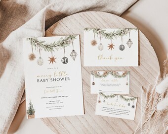 May include: A set of printable baby shower invitations with a Christmas theme. The invitation features a green garland with ornaments and stars hanging from it. The text on the invitation reads "Join us for a merry little baby shower".
