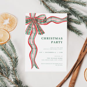 May include: A Christmas party invitation featuring a watercolour bow in red, green, and white. The invitation includes the text "Christmas Party" and event details. The image also features dried orange slices, pine branches, and cinnamon sticks.