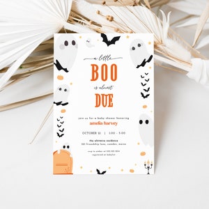 May include: A white card with a Halloween baby shower invitation. The card features a ghost with the text "a little BOO is almost DUE". The invitation is decorated with orange and black bats and pumpkins.