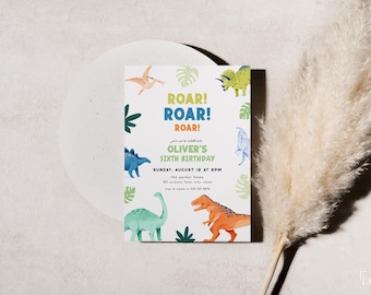 May include: A white invitation card with colorful dinosaur illustrations and the text "ROAR! ROAR! ROAR!" announcing Oliver's sixth birthday on August 12th at 2 PM. The card features a pterodactyl, triceratops, and other dinosaurs.