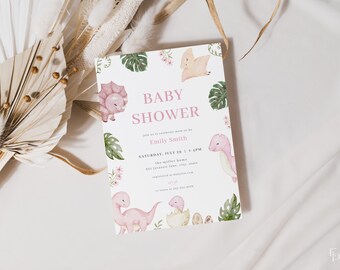 May include: A pink and green baby shower invitation featuring a watercolour illustration of dinosaurs. The invitation reads "Baby Shower" and includes the name "Emily Smith" and the date "Saturday, July 28 | 1-4PM".