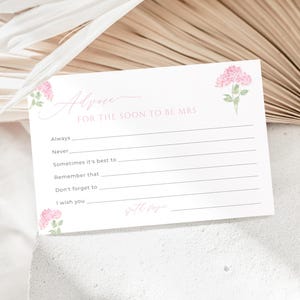 Könnte beinhalten: Eine weiße Karte mit rosa Blumenakzenten und dem Text "Ratschläge für die zukünftige Braut" mit Zeilen zum Schreiben von Ratschlägen.