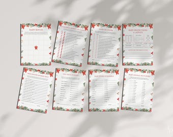 May include: A collection of eight baby shower game cards with festive red and green floral and bow accents. The cards feature titles like "Baby Bingo," "Guess Who Mommy or Daddy," and "Baby Predictions & Advice."