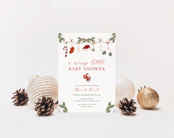 May include: A Christmas-themed baby shower invitation with a red and white candy cane, red stocking, a baby rattle, a Santa hat, and a pair of green mittens hanging from a garland. The text reads "A Merry Little Baby Shower" and "Nicole Frost".