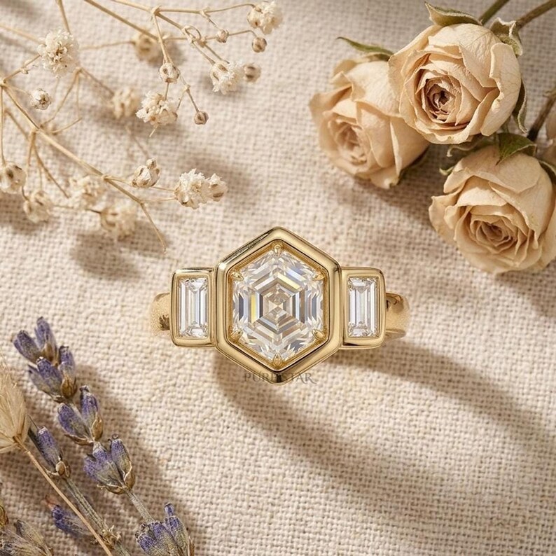 Unique lab grown diamond engagement ring with baguette accents in solid gold.