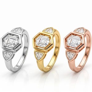 Sustainable lab grown diamond ring with trillion side stones and geometric elegance.