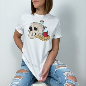 Pick Your Poison Skull and Potions T-Shirt | Skull, Potions, and Curiosity Collide | Skull T-Shirt | Graphic Tee | Unisex T-shirt