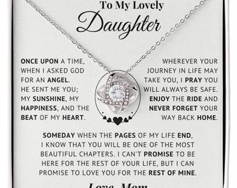 Love Knot Necklace: 14k White Gold with Cubic Zirconia