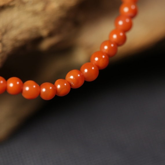 Old raw Aka coral bracelet, Stretchy red coral bea