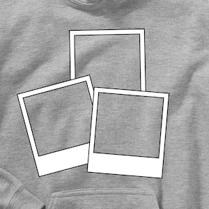 May include: Gray hoodie with a white outline of three instant camera frames.