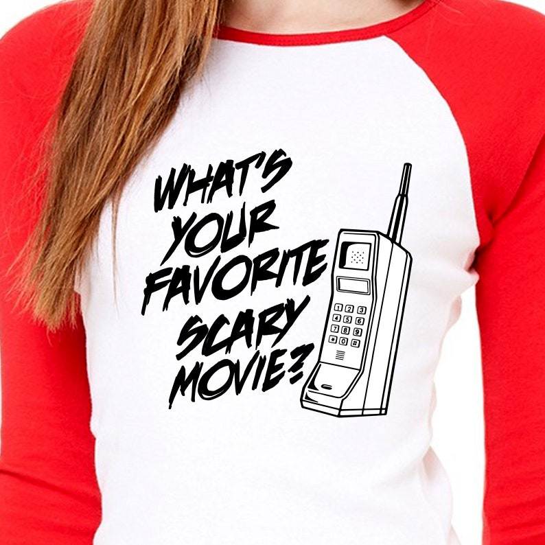 May include: A white and red baseball t-shirt with black text that reads "What's your favorite scary movie?" and a black and white illustration of a vintage rotary phone.