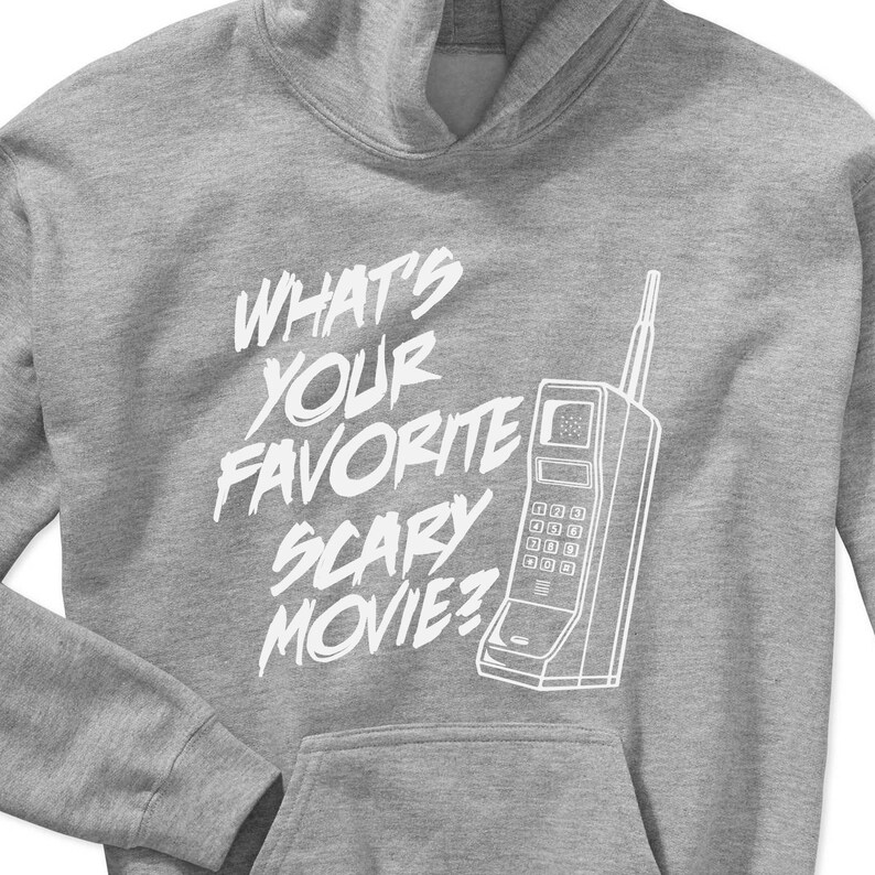May include: Gray hoodie with a white graphic of a vintage rotary phone and the text "What's your favorite scary movie?"